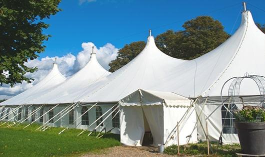 a group of luxury portable restrooms with individual stalls and running water in Malabar